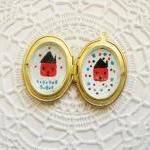 Hand Painted Brass Oval Photo Locket With Two..
